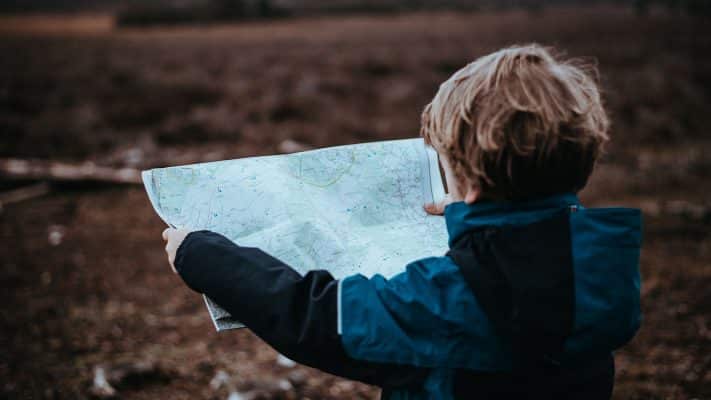 Child reading map image