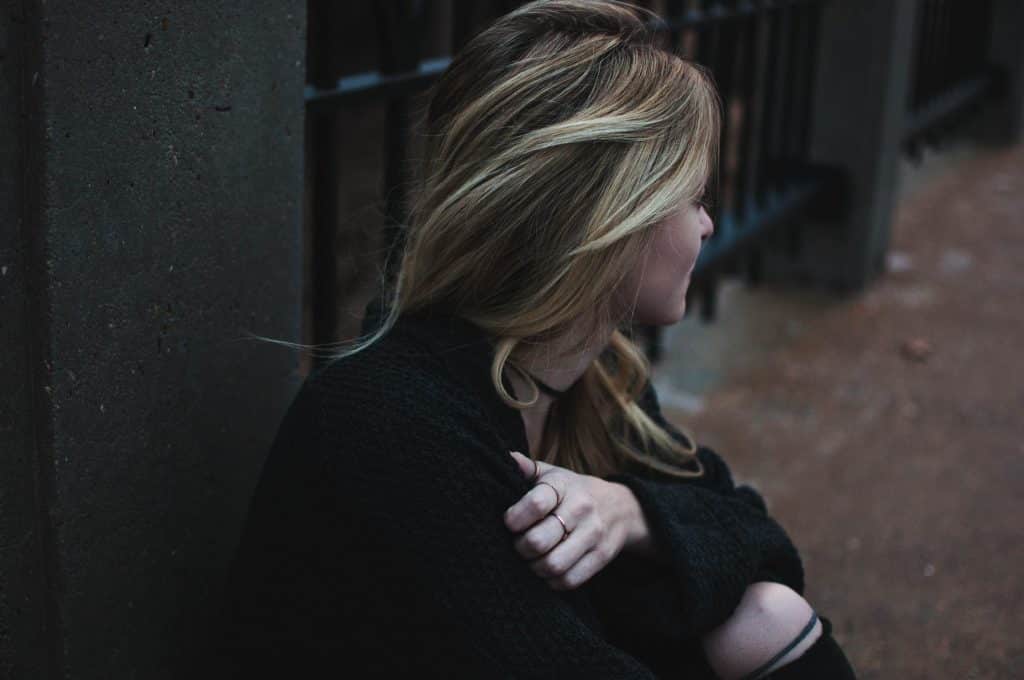 woman sitting on floor